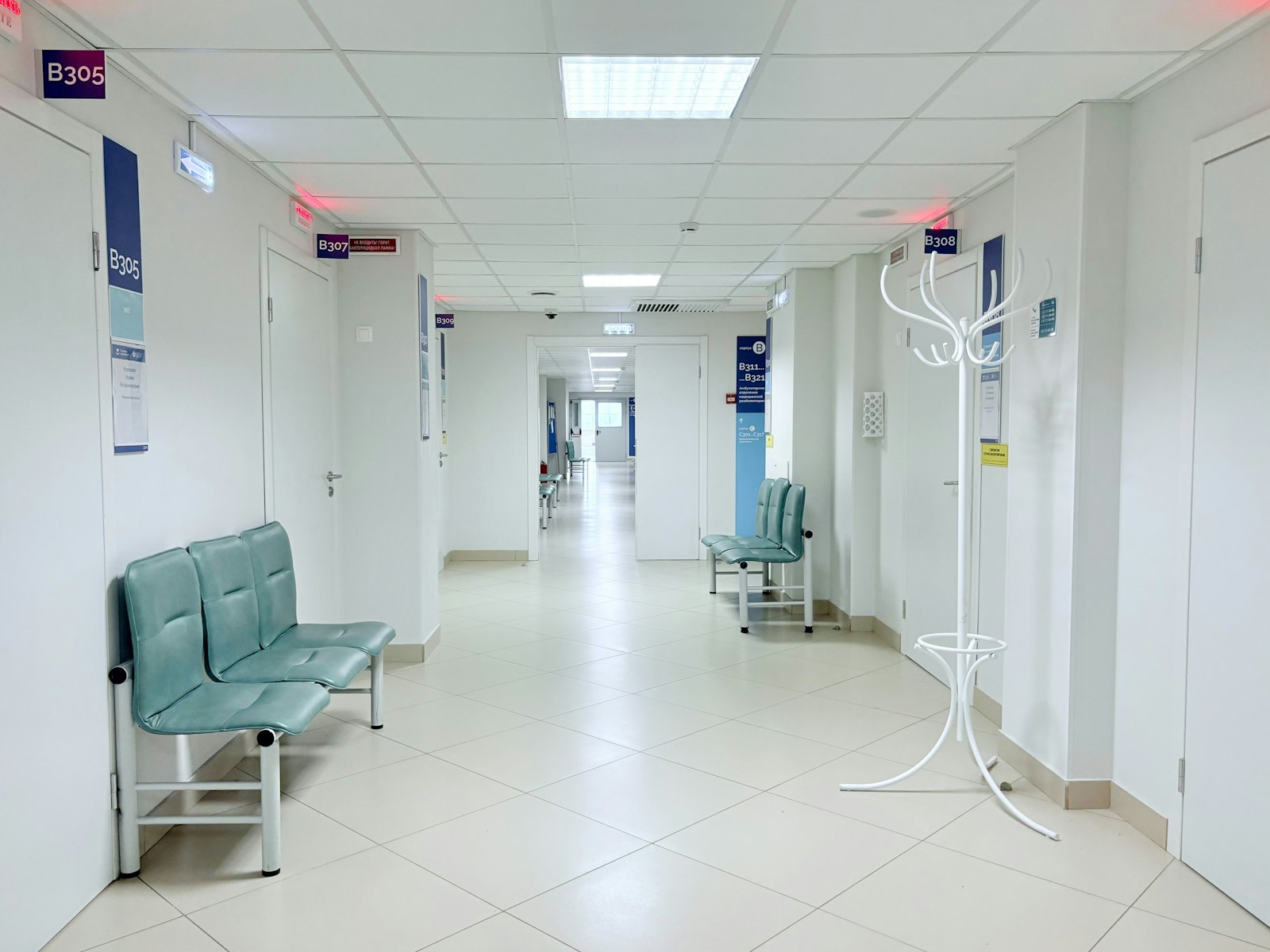 Ductwork and diffuser above an exam room ceiling in a Dallas medical clinic